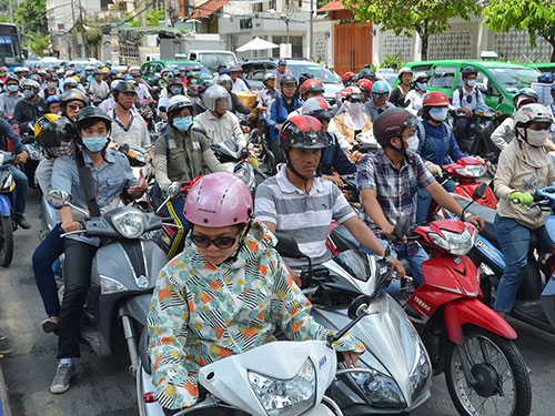 Báo cáo Thủ tướng việc tạm dừng thu phí sử dụng đường bộ xe mô tô